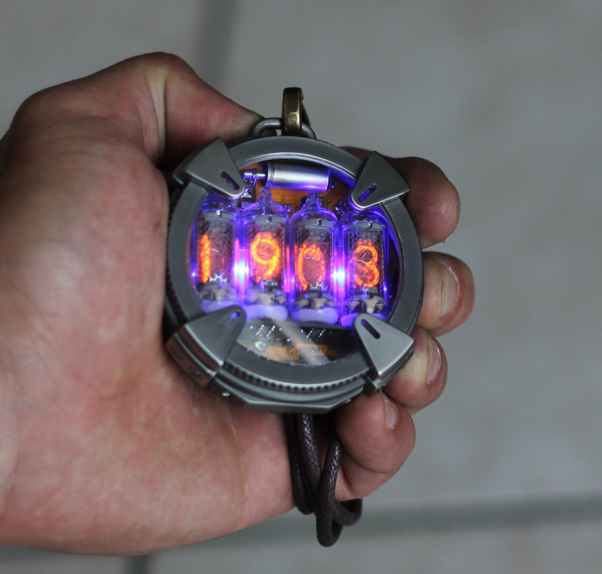 Nixie watch , Handmade ,Pocket titanium watch, Nixie watch , with γ , β and X-ray radiation dosimeter.
