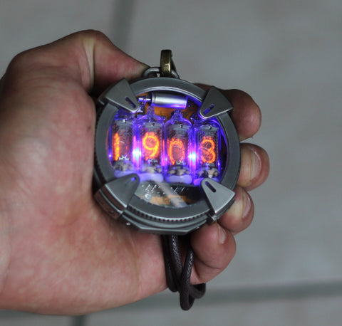 Nixie watch , Handmade ,Pocket titanium watch, Nixie watch , with γ , β and X-ray radiation dosimeter.
