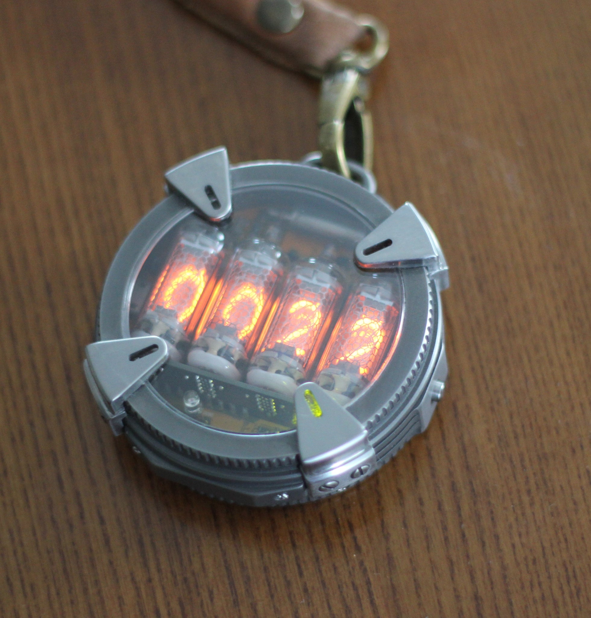 Nixie watch , Handmade ,Pocket titanium watch, Nixie watch , with γ , β and X-ray radiation dosimeter.
